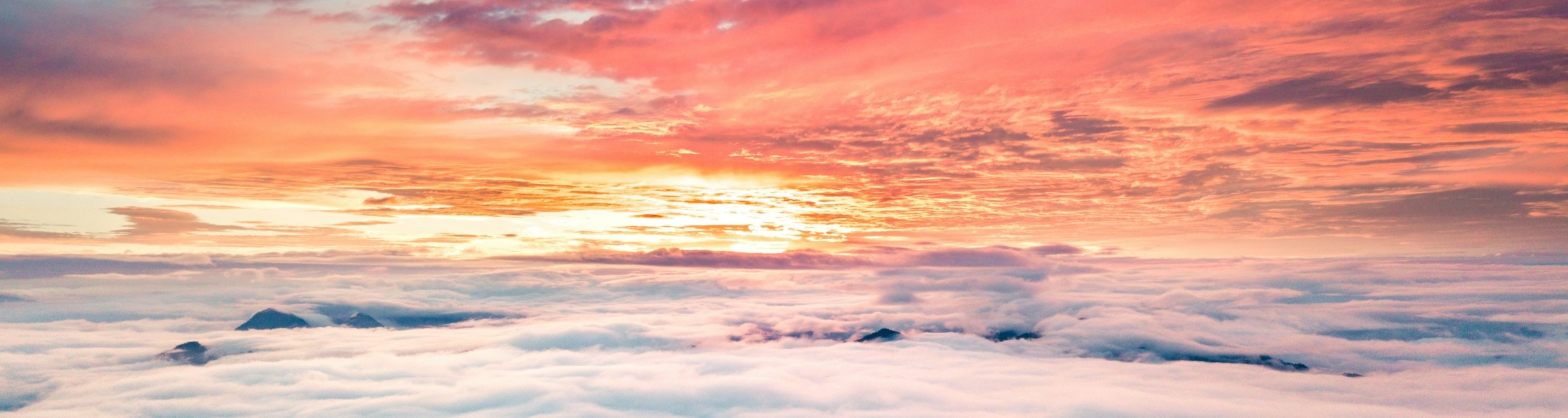 dramatic clouds above and below